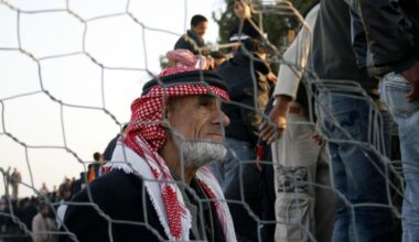 Palestinians stuck in Egypt wait to cross into Gaza at Rafah's border crossing, in the southern Gaza Strip. Egypt has warned Palestinians against trying to break through its resealed Gaza border about two weeks after Hamas militants blew it open to defy an Israeli-led blockade in January 2008. (Photo: APA Images)