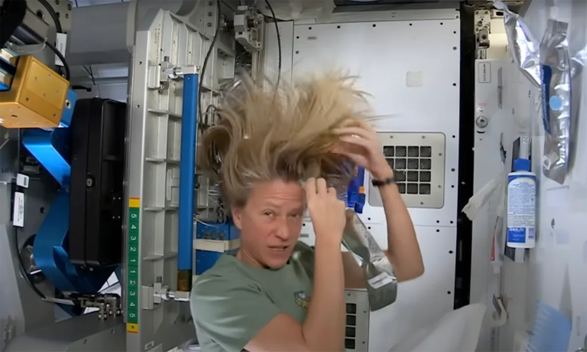 Astronaut Karen Nyberg shows us how she washes her hair in space. Credit: NASA