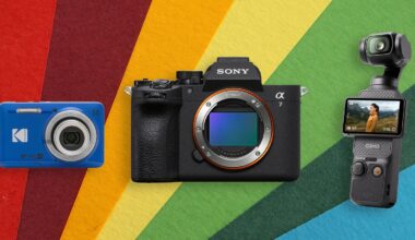 Three cameras—a blue Kodak compact, a Sony Alpha mirrorless, and a DJI Osmo Pocket—are displayed side by side against a colorful, striped, textured background.