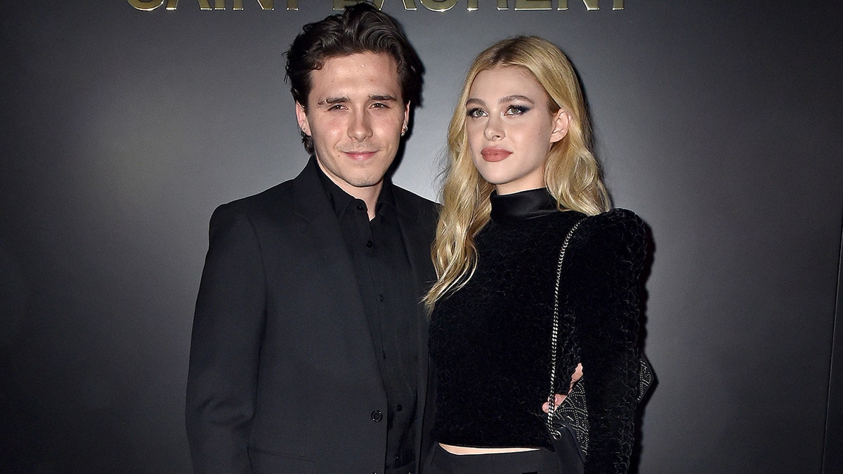Brooklyn Beckham and Nicola Peltz at the Saint Laurent fashion show during Paris Fashion Week in February 2020.