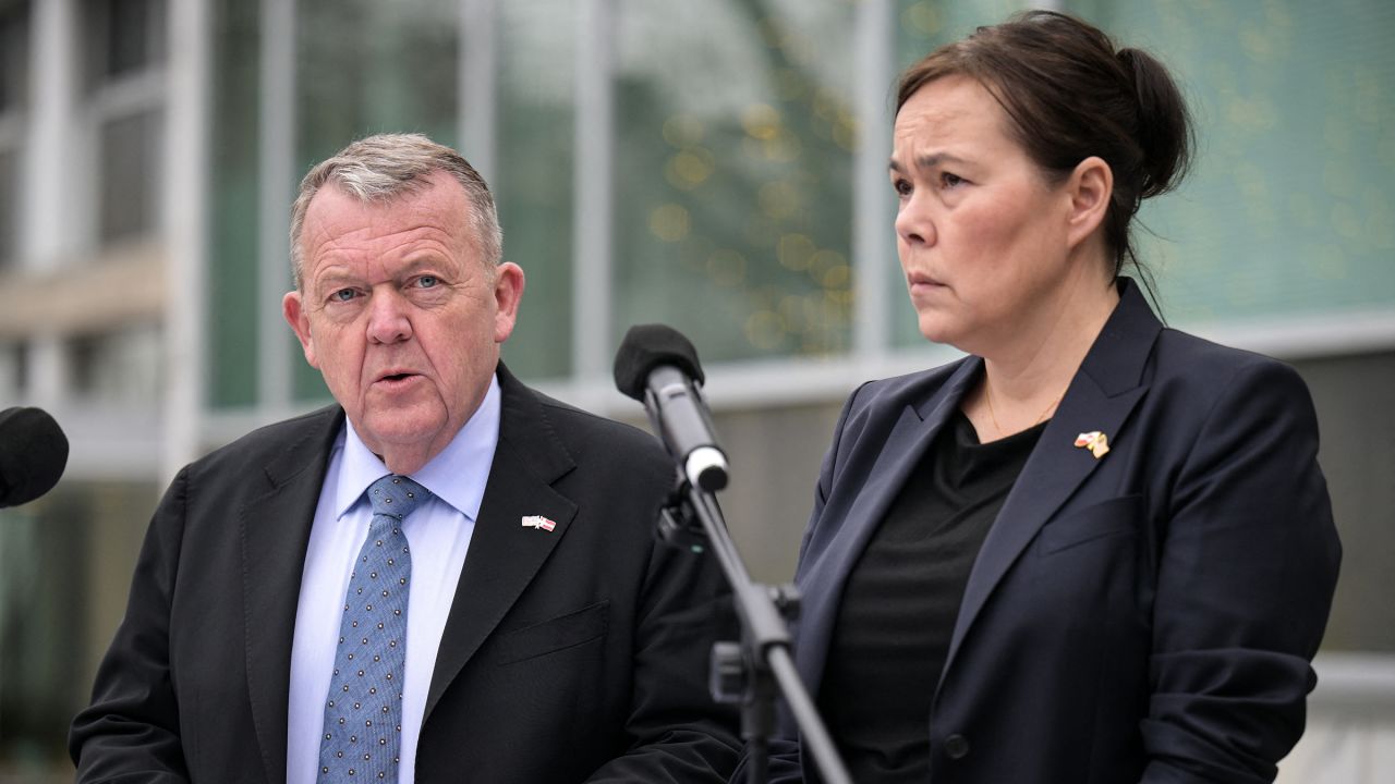 Danish Foreign Minister Lars Løkke Rasmussen and Greenland's Foreign Minister Vivian Motzfeldt speak during a news conference at the Danish Embassy in Washington, DC, on January 14.