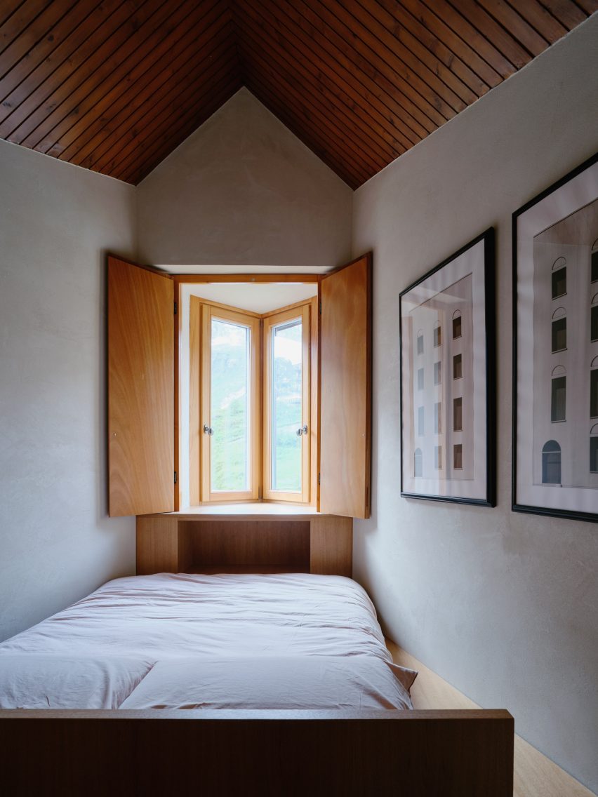 Loft bedroom with corner window in Co.arch Studio apartment renovation in Mario Galvagni's Giomein