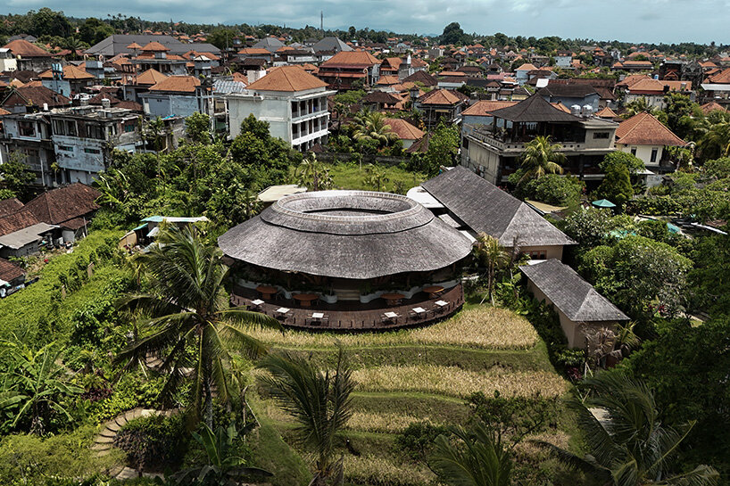 circular bamboo roof collects rainwater at balinese restaurant by pablo luna studio