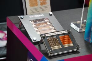 Cu Thin film samples and comparison model of poly-crystal and single-crystal structures on display
