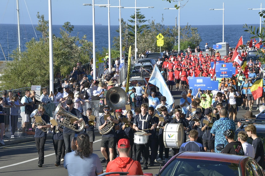 A brass band marches through the streets of Wollongong.