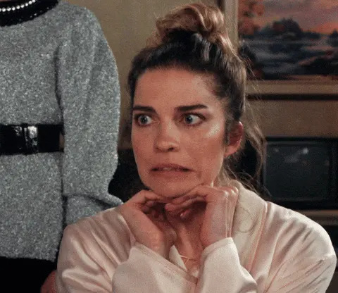 Alexis from "Schitt's Creek" makes a "yikes" face