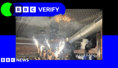 A branded image with the BBC Verify logo, with a blue border surrounding an image of sparklers attached to champagne bottles being held up by people in the Swiss ski resort bar just before the fire started - with a small orange patch of fire seen on a foam ceiling above the sparklers.