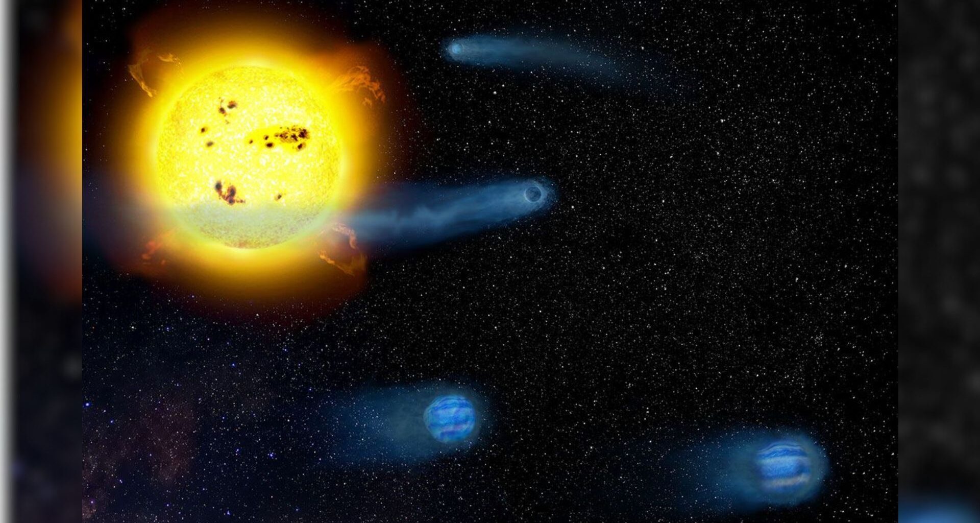 A series of small blue planets swirl around a golden sun in the top left corner in deep space