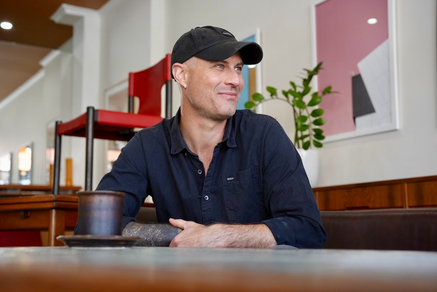 John Morgan in his mid-century furniture store on Victoria Street