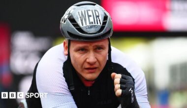 Great Britain's David Weir gives a thumbs up after completing the London Marathon