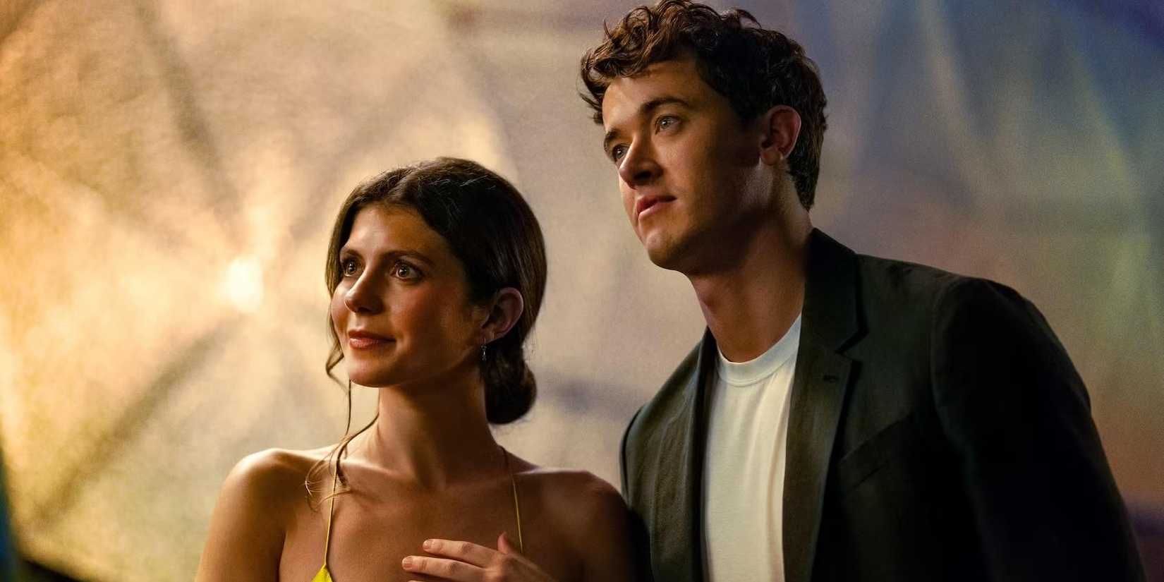 Emily Bader and Tom Blyth standing together in People We Meet on Vacation