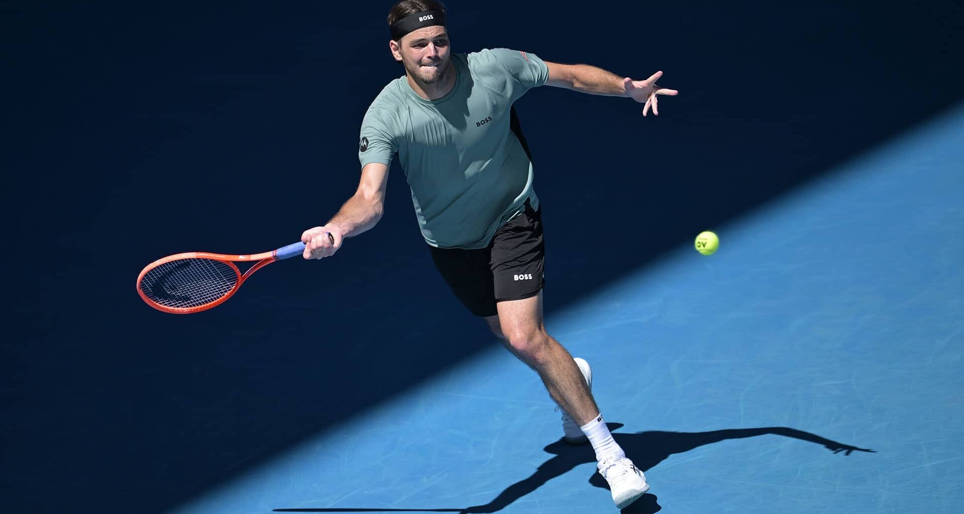 Taylor Fritz in action on Monday against Lorenzo Musetti in Melbourne.