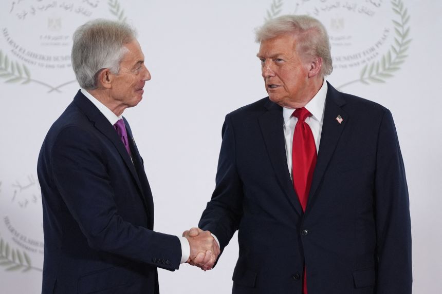 US President Donald Trump greets former British Prime Minister Tony Blair during a summit on Gaza in Sharm el-Sheikh in Egypt on October 13, 2025.