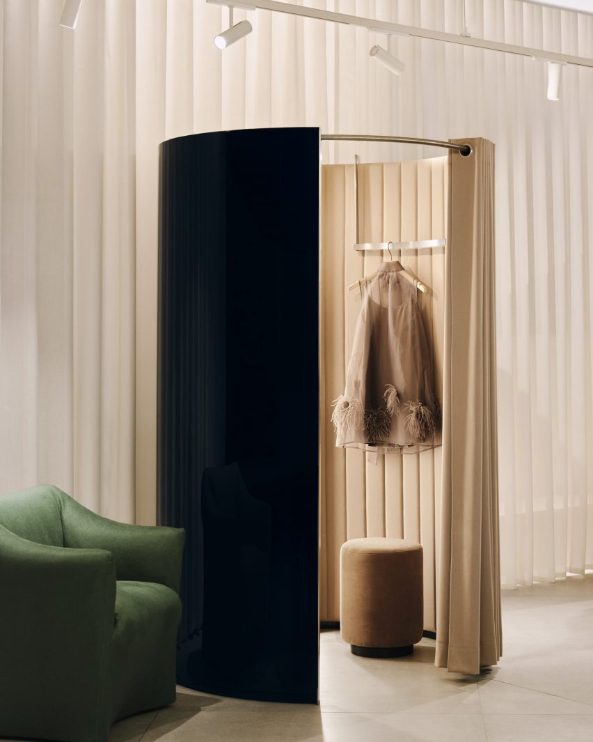 Changing room in front of soft drapes