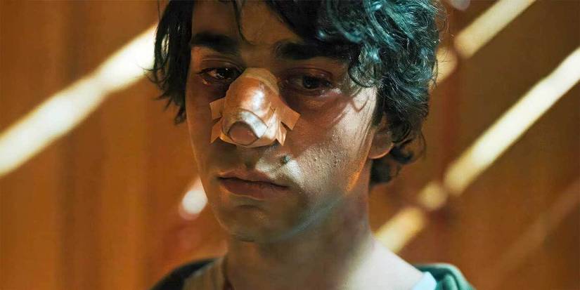 Alex Wolff as Peter looking serious in Hereditary.
