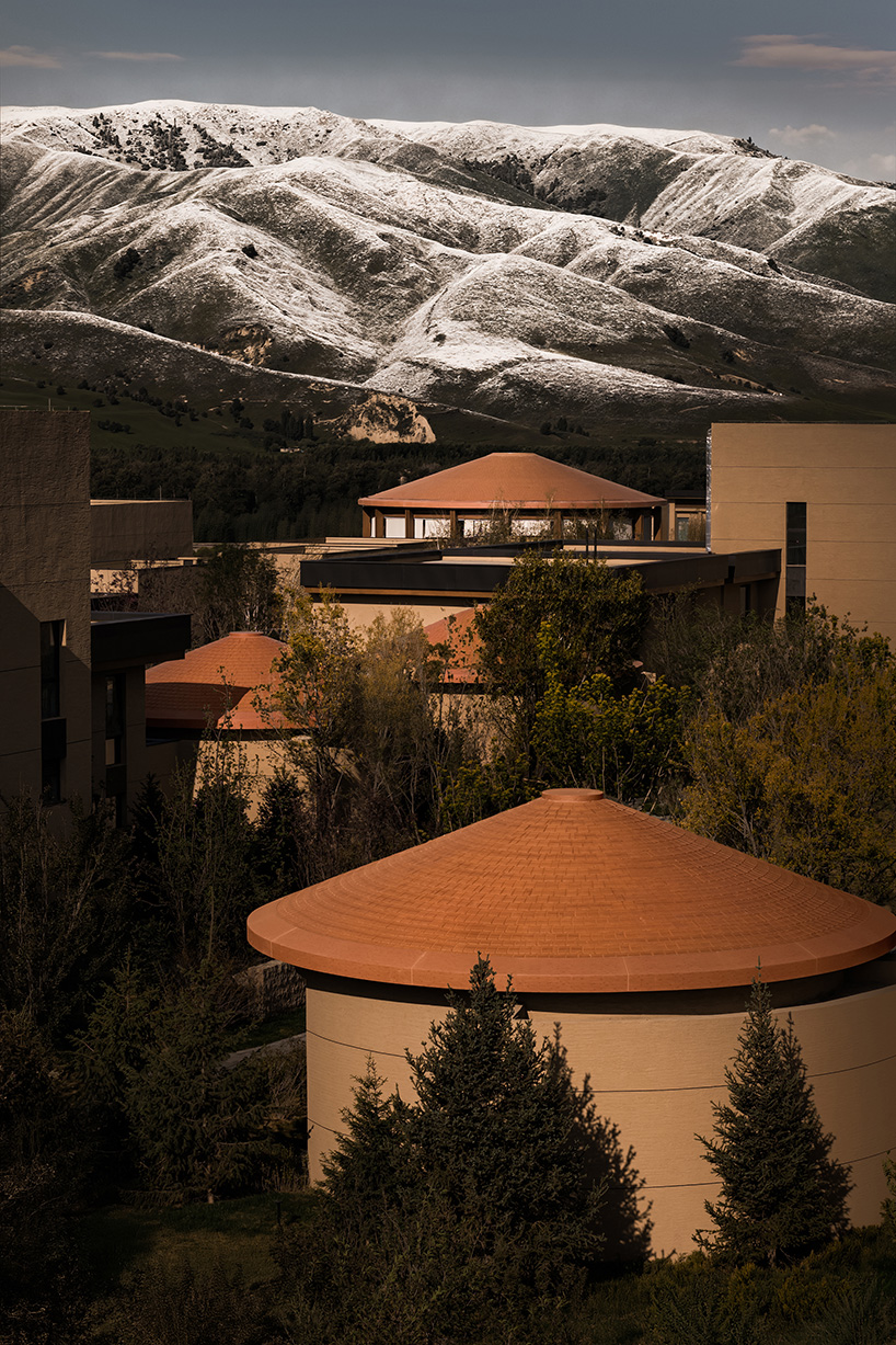 hotel by ccd reinterprets nomadic cultural patterns through dispersed brick volumes in china