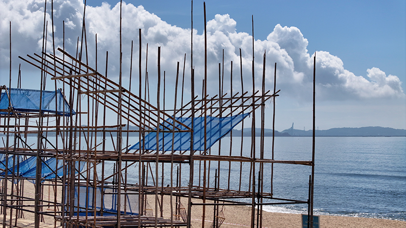 traditional bamboo scaffolding constructs temporary theater along chinese coast