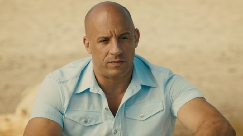 Dominic Toretto sitting on the beach in Furious 7