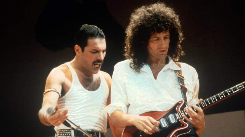 Freddie Mercury and Brian May performing