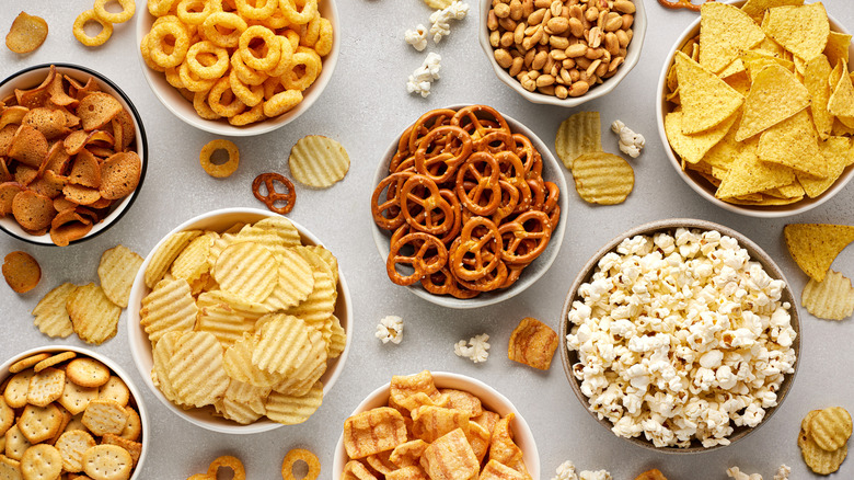 Bowls of various snack foods laid out