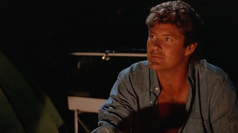 David Hasselhoff as Mitch Buchannon sitting in the dark on Baywatch Nights