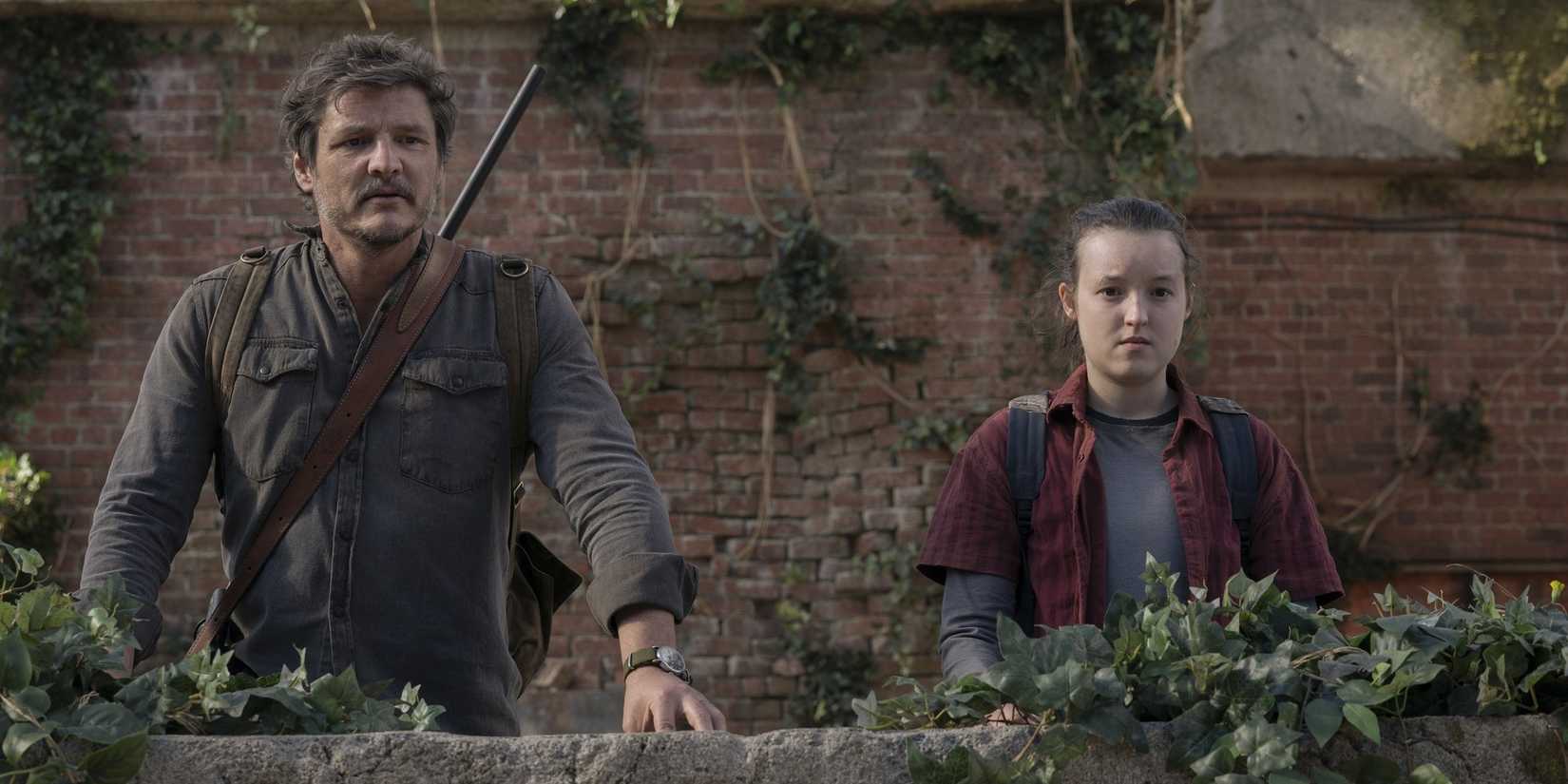 Joel and Ellie looking off-screen in The Last of Us