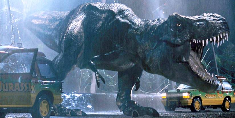 The T-Rex roaring after breaking out of its enclosure between two vehicles in Jurassic Park.