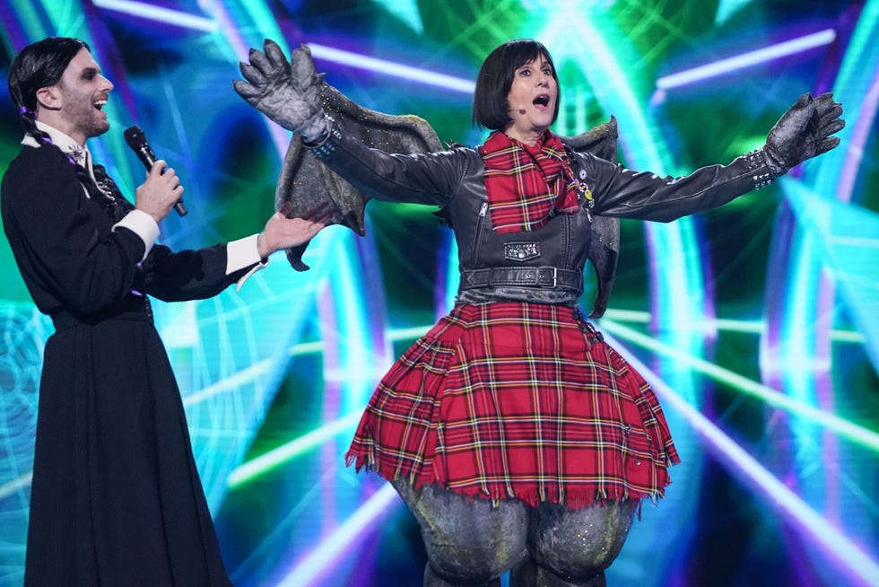 performance scene with characters in costume on stage