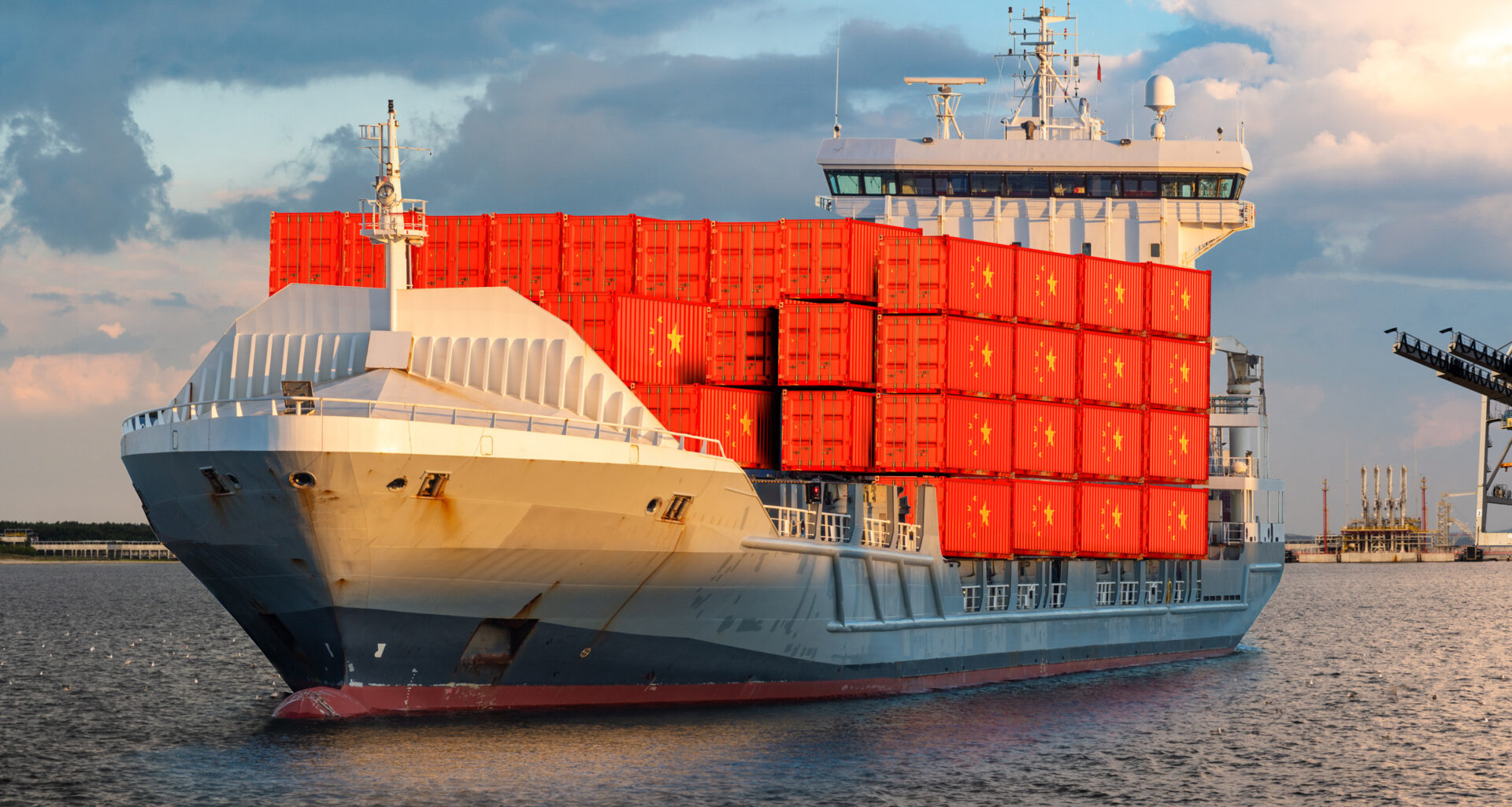 Container ship leaving a dock carrying containers illustrated with the flag of China. Credit: Adobe