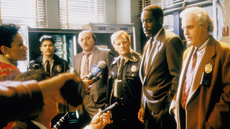 The cops of NYPD Blue answer questions for reporters