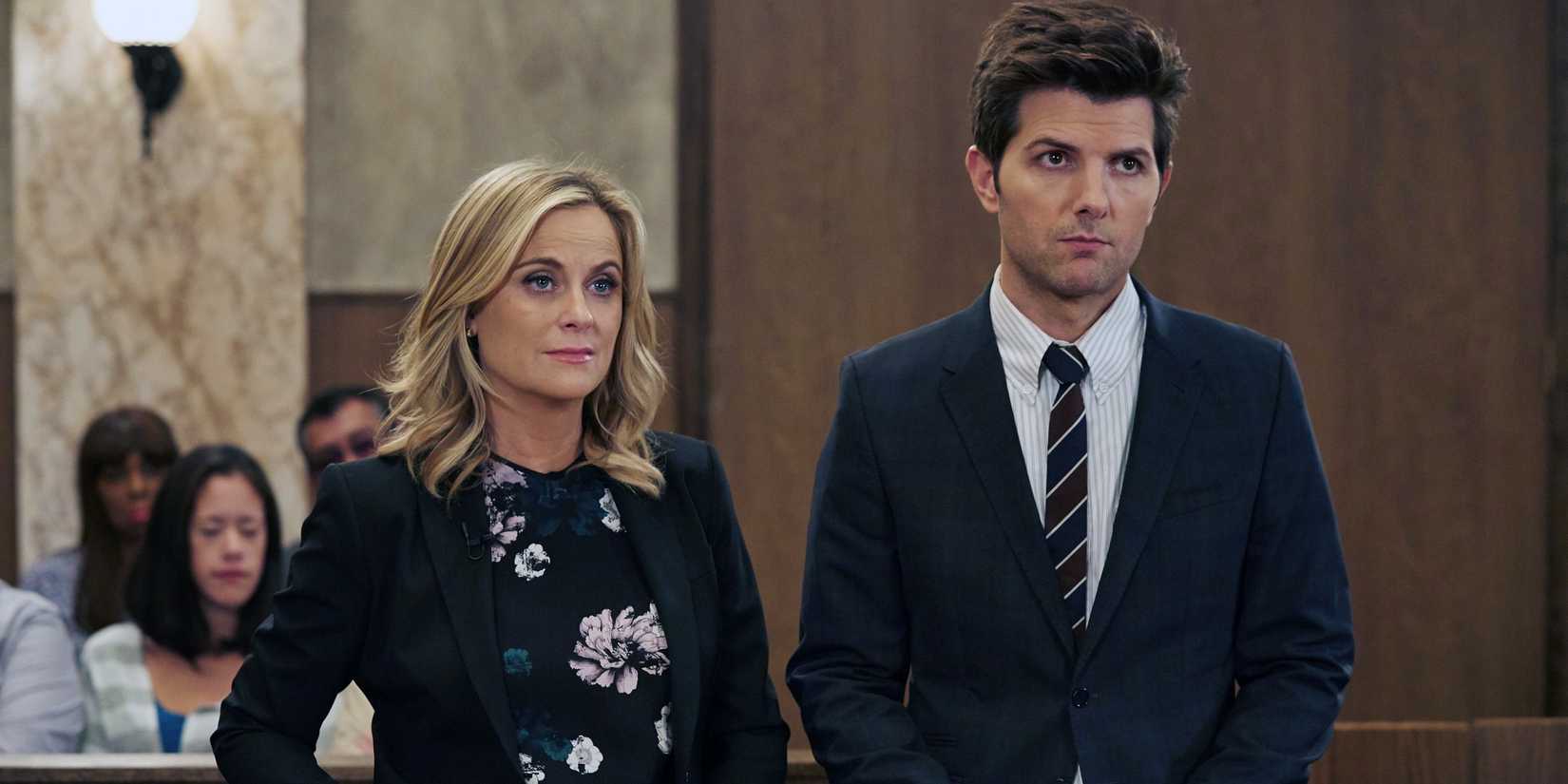 Amy Poehler as Leslie Knope and Adam Scott as Ben Wyatt in Parks and Recreation.