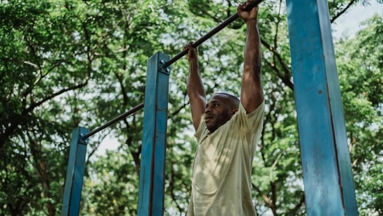The dead hang is one of the exercises that Raj Ganpath suggests we incorporate in our daily workouts. (Pexel)