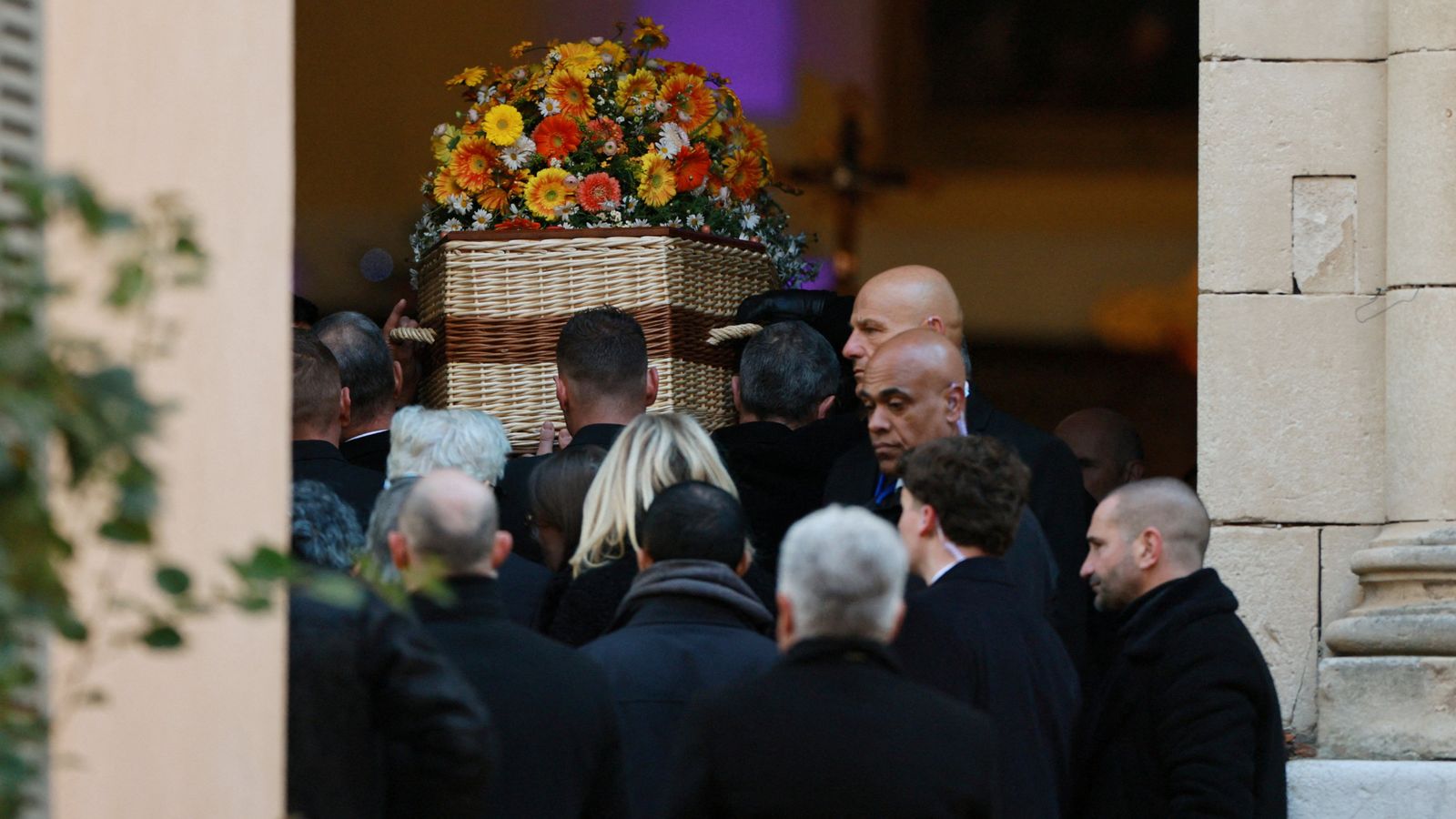 Pallbearers carry the coffin of the late French film icon into  the Notre-Dame-de-l'Assomption Catholic Church. Pic: Reuters