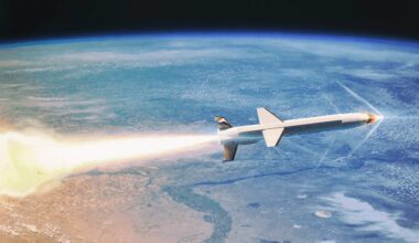 The SpaceWorks X-60 rocket is pictured in flight in the upper atmosphere, with the curvature of the Earth below it.