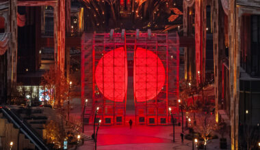 SpY's divided sphere installation illuminates xi’an in bright red light