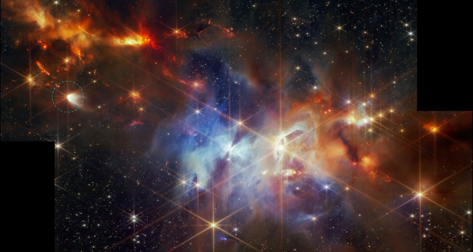 A rectangular image of the Serpens Nebula with black vertical rectangles at the bottom left and top right to indicate missing data. A young star-forming region is filled with wispy orange, red, and blue layers of gas and dust. The upper left corner of the image is filled with mostly orange dust, and within that orange dust, there are several small red plumes of gas that extend from the top left to the bottom right at the same angle. At center-left is a larger star that is circled. This star has Webb’s signature diffraction spikes, but along the right also has an arc of white, with the circular edge starting at the center of the star. Mostly blue gas fills the center. There is a particularly bright central star. The gas to the right is a darker orange. Small points of light are sprinkled across the field. The brightest sources have extensive eight-pointed diffraction spikes.