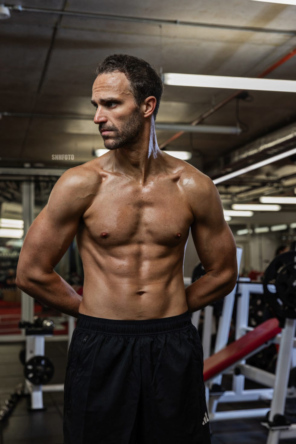 muscular individual in a gym setting