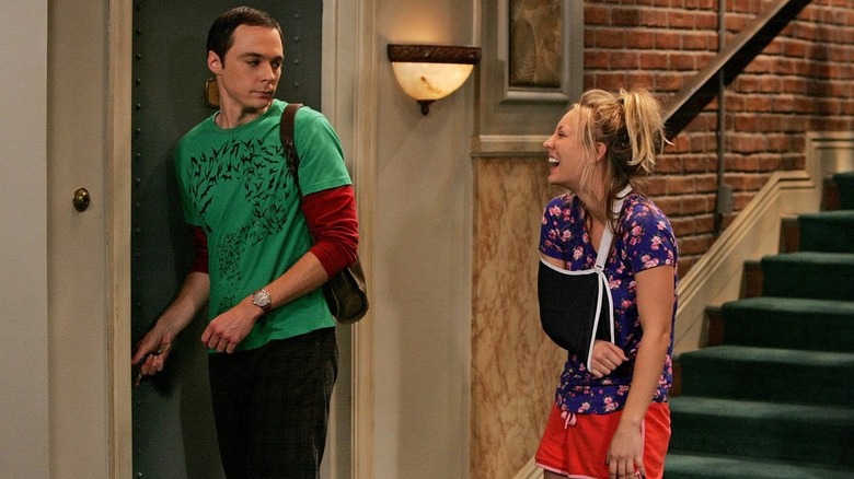Sheldon talking to an injured Penny in the hallway on The Big Bang Theory