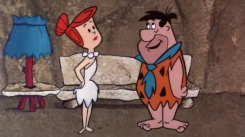 Wilma addresses a sheepish-looking Fred on The Flintstones