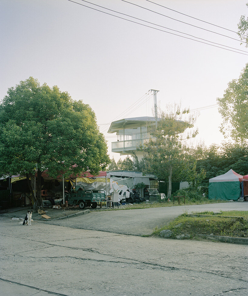 tiny 24-hour bookstore by SZ-architects crowns former prison watchtower in china