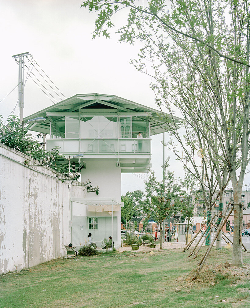 tiny 24-hour bookstore by SZ-architects crowns former prison watchtower in china
