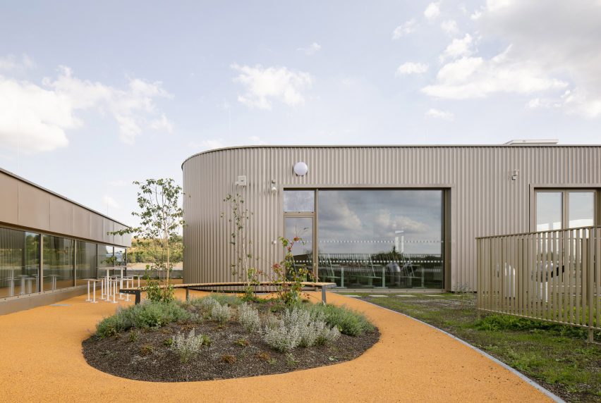 Corrugated metal classrooms at Vida Elementary School