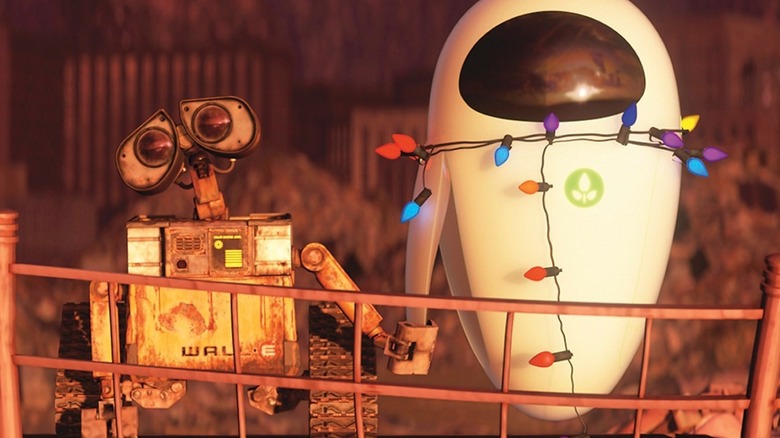 WALL-E and EVE holding hands in 