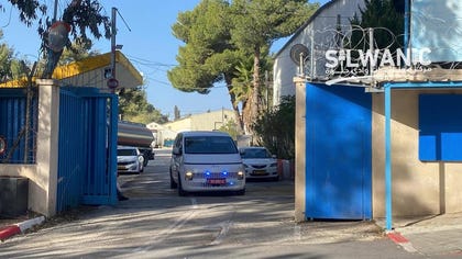 An Israel police vehicle at the entrance to the UNRWA headquarters in Sheikh Jarrah during the raid, December.