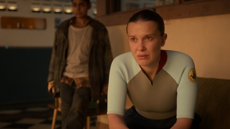 Eleven and Kali listen to Will's coming-out speech in Stranger Things