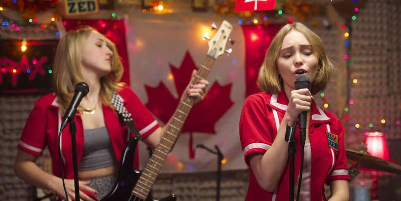 Harley Quinn Smith and Lily-Rose Depp singing in their band in Yoga Hosers.
