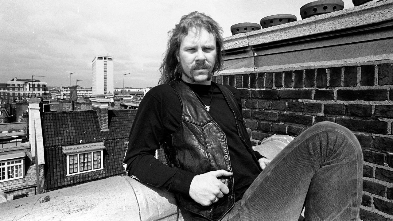 James Hetfield shot on a rooftop in London in black and white, looking serious
