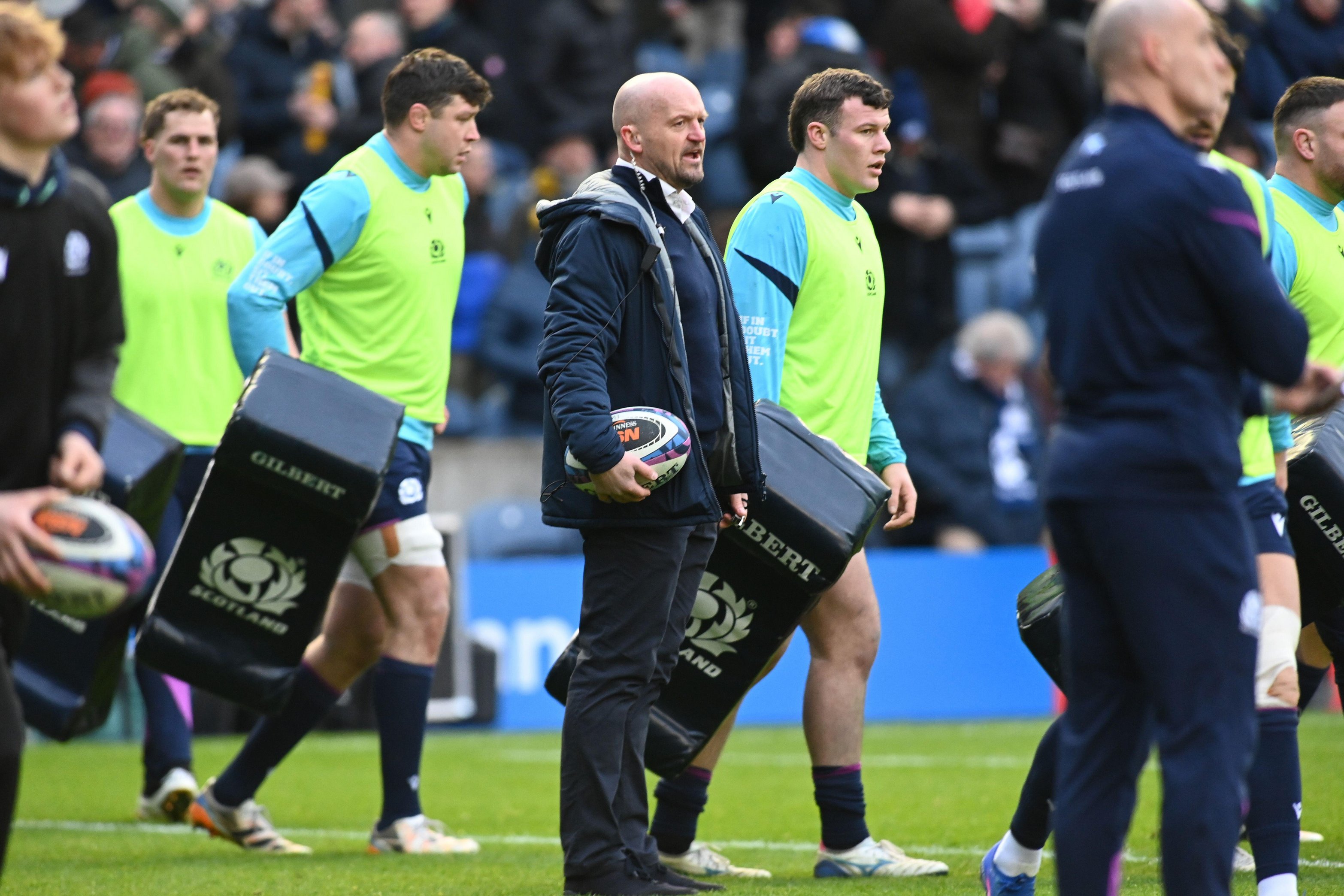 Scotland head coach Gregor Townsend holds a rugby ball on the field at Scottish Gas Murrayfield.