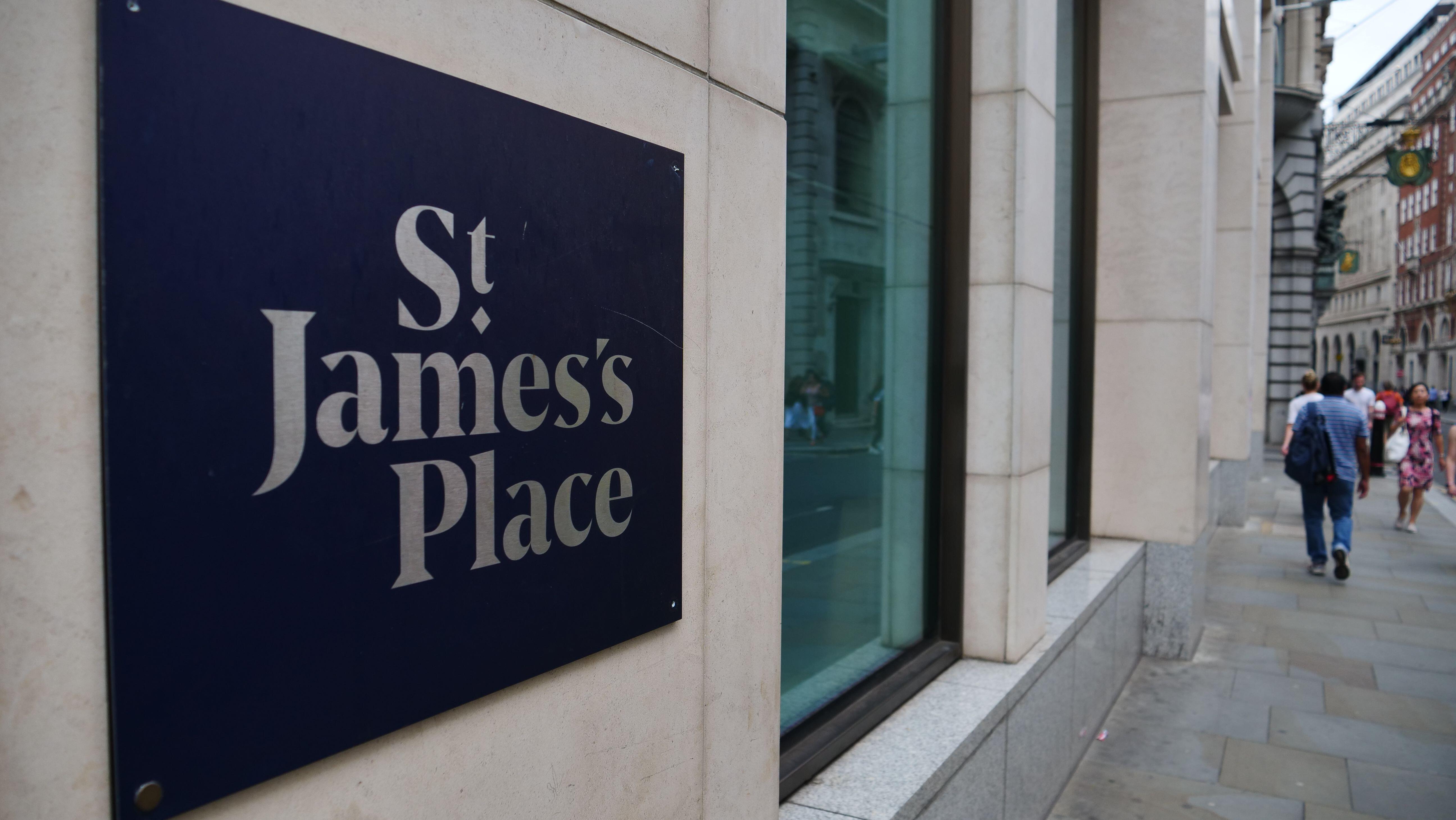 Sign for St. James's Place financial advisers in Lombard Street, London.