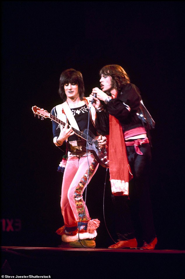 When Ronnie Wood joined the Stones in 1975, he entered a band that had already written its most iconic, royalty-generating hits (Ronnie and Mick pictured in 1979)